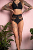 EMPIRE SHORTS ZWART MET EEN BROEK IN EEN WARME KLEUR